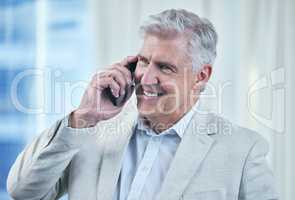 I never let opportunity slip me by. a mature businessman talking on his cellphone.