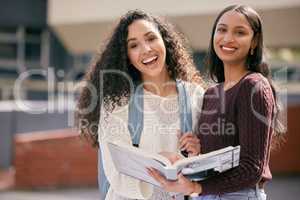 Its not just hard work, its also hearty laughs. two young women studying together at college.