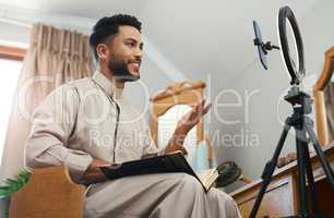 Todays lesson is love. a young muslim man busy recording his for her vlog.