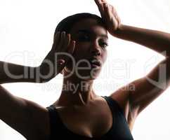 The rest dont compare. Silhouette shot of a beautiful young woman posing against a white background.