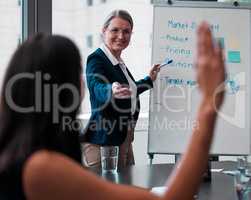 Yes have you got an idea for me. a mature businesswoman giving a presentation at work.