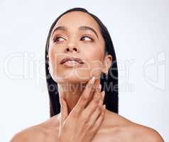 Filters are great but great skin is better. Studio shot of a beautiful young woman posing against a grey background.