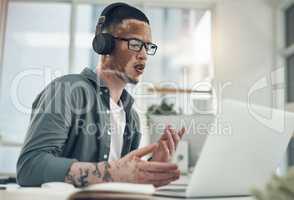 People who succeed have momentum. a young business busy with a video call at work.