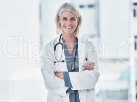 Skip the internet search, come see me. Portrait of a confident mature doctor working at a clinic.