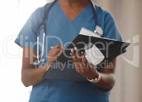 Did someone order a dose of good health. an unrecognisable doctor holding a clipboard and thermometer.