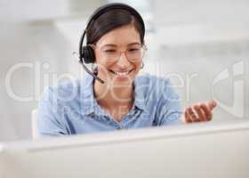 Yes i can see the information right now. a young businesswoman working at a call center.