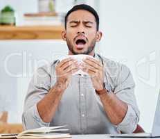 Oh no this is the worst time to get sick. a young businessman sneezing due to allergies.