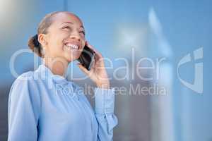 Businesswoman talking on a phone call, smiling joyful at the news received. Happy female manager on a cellphone chatting. Lady having pleasant phone conversation with client.