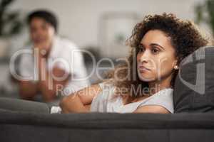 Speak to the hand cause face aint listening. a young woman ignoring her partner at home.