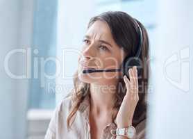 I can certainly help you. a young businesswoman working in a call center.
