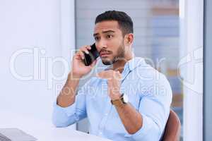 Im unhappy with the changes made. a young businessman using his smartphone to make a phone call.
