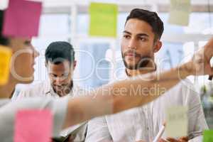 Could you explain this. businesspeople having a meeting in a boardroom at work.