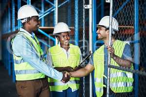 To build the best, work with the best. builders shaking hands at a construction site.