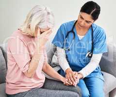 Well get you the support you need to get through this. a female nurse comforting her patient.