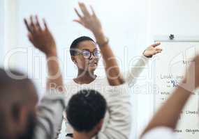 Were hungry for wisdom. a young woman giving a presentation in a modern office.