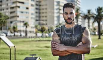 Its my destiny to become a beast. Portrait of a sporty young man exercising outdoors.