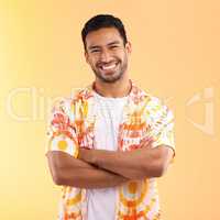 I hope my smile brings a smile to your face too. a young man wearing a tie dye shirt while standing against a yellow background.