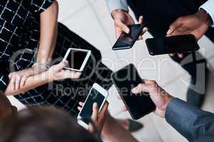 Creating connections daily. the hands of businesspeople using phones.