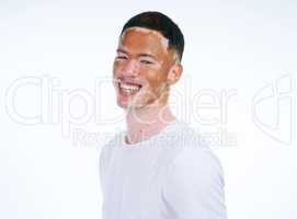 I always love the spotlight. Portrait shot of a handsome young man with vitiligo posing on a white background.
