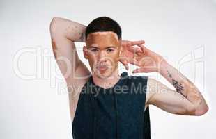 Why fit in when you were born to stand out. Portrait shot of a handsome young man with vitiligo posing in studio.