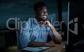 Positivity pushes you forward. a young businessman using a computer during a late night at work.