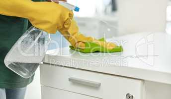Clean it like you mean it. an unrecognisable woman cleaning a modern office.