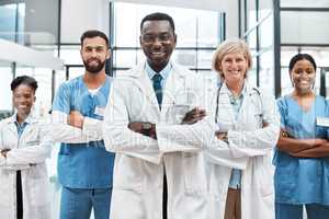 Multidisciplinary care is an integrated team approach to healthcare. Portrait of a group of medical practitioners standing together in a hospital.