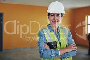 Get in touch with me to get the job done. Portrait of a confident young woman working at a construction site.