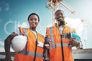 Prime property built on a foundation of equality. Portrait of a confident young man and woman working at a construction site.
