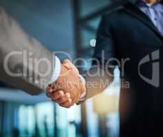 Handshake, teamwork and collaboration with businessmen congratulating with hand gesture on success for a sealed deal or agreement. HR manager hiring employee or partner after a successful interview