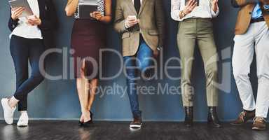 Connected, communication and network of diverse businesspeople using multimedia technology, waiting for an interview. Professional group standing in a row, browsing social media with online apps