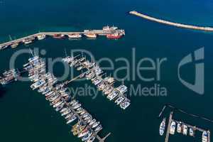 Oh the places youll go in your boat. High angle shot of boats at a seaside harbour.