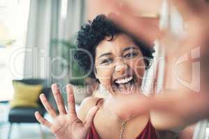 If you just joined my page, hi there. a beautiful young woman recording herself at home.