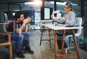 Perception is everything. a mature psychologist conducting an inkblot test with her patient during a therapeutic session.