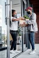 The faster the delivery, the more fresh your food. a masked young man delivering fresh produce to a customer at home.