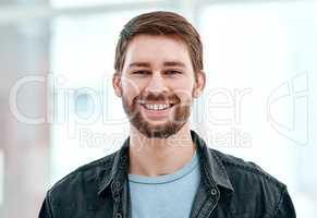 Your mind has the power to inspire positive change. Portrait of a happy young man at home.