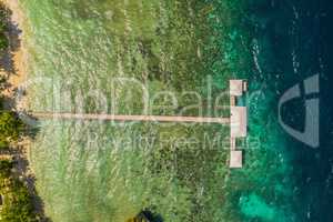 Along the pier. High angle shot of a pier somewhere on the Islands of Raja Ampat, Indonesia.