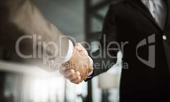 Handshake hand gesture showing success, support and trust. Closeup fingers of executive office business men making a deal, agreeing and approving or welcoming, greeting and promoting