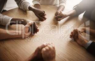 Care, support and teamwork by group of people holding hands in a circle. Community, trust and strength in togetherness, team with a vision or idea. Partnership between ambitious colleagues huddling