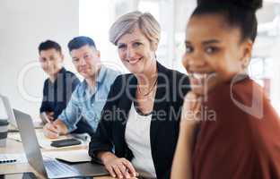 Only the best in our boardroom. Portrait of a group of businesspeople having a meeting in a modern office.