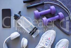 The self improvement starter pack. Studio shot of a variety of workout equipment against a grey background.