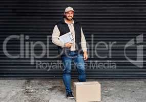 You can ship with certainty with us. Portrait of a courier holding a clipboard.