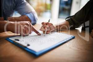 Lawyer, broker or HR manager signing a contract agreement with client or employee. Financial advisor asking for womans signature for insurance, legal paperwork or claim document