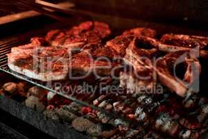 Grilling food brings out so much more flavour. Closeup shot of meat being barbecued on a grill.