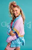 My wardrobe is full of items from the 80s. Studio shot of a beautiful young woman wearing a 80s outfit.