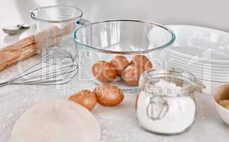 Bake it til you make it. various baking items on a kitchen counter at home.