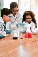 And that is how steam forms... an adorable little boy and girl conducting a scientific experiment with their teacher at school.