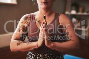 Connect to a deeper sense of purpose in your life. Closeup shot of a woman meditating at home.