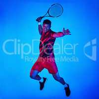 Theres nothing a game of tennis cant fix. Blue filtered shot of a man posing with a tennis racket in the studio.