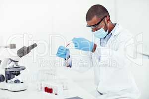 Innovation, science and medical discovery in a lab with a male scientist working with medical samples. Leading health care professional conducting an experiment with blood, creating cure or treatment